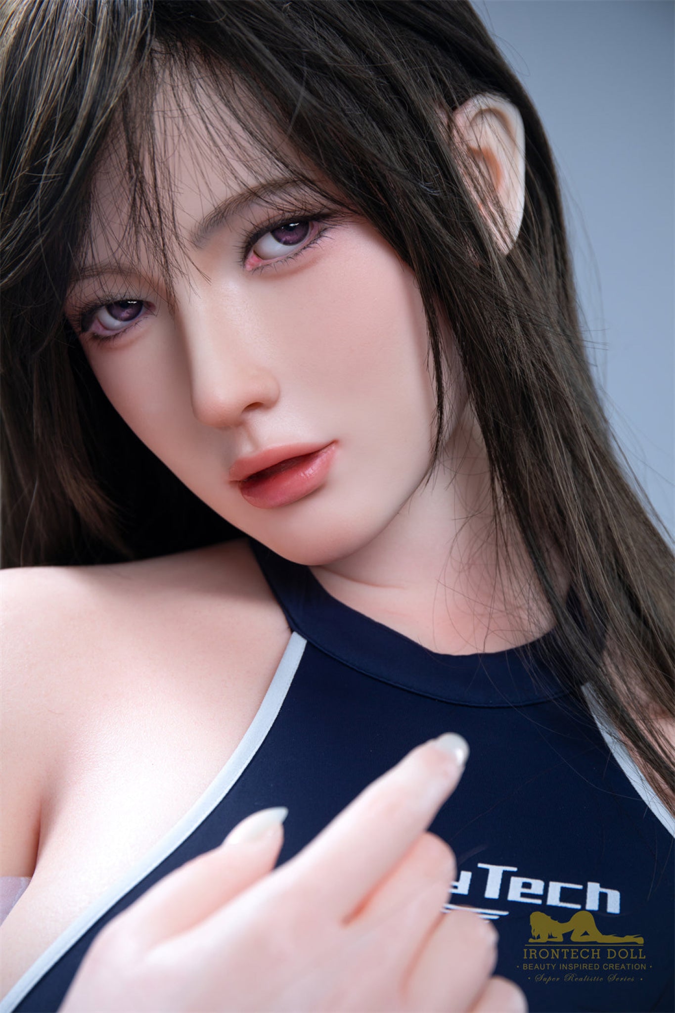 "5ft6 C-Cup Miya 164cm silicone doll by Iron Tech in a tasteful pose"